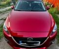 Красный Мазда 3, объемом двигателя 2 л и пробегом 77 тыс. км за 11599 $, фото 1 на Automoto.ua