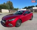 Красный Мазда 3, объемом двигателя 2 л и пробегом 78 тыс. км за 12823 $, фото 1 на Automoto.ua