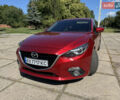 Красный Мазда 3, объемом двигателя 1.5 л и пробегом 213 тыс. км за 13500 $, фото 1 на Automoto.ua