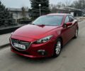 Красный Мазда 3, объемом двигателя 2 л и пробегом 158 тыс. км за 10800 $, фото 1 на Automoto.ua