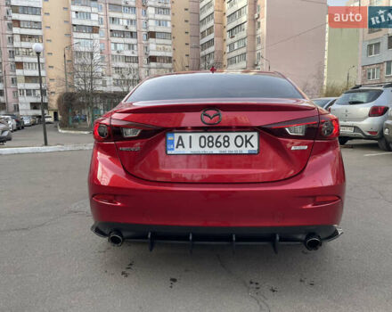 Красный Мазда 3, объемом двигателя 2 л и пробегом 163 тыс. км за 12500 $, фото 4 на Automoto.ua