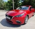 Красный Мазда 3, объемом двигателя 2 л и пробегом 121 тыс. км за 10900 $, фото 1 на Automoto.ua