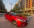 Красный Мазда 3, объемом двигателя 2.49 л и пробегом 106 тыс. км за 14000 $, фото 1 на Automoto.ua