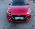 Красный Мазда 3, объемом двигателя 1.5 л и пробегом 126 тыс. км за 13650 $, фото 1 на Automoto.ua