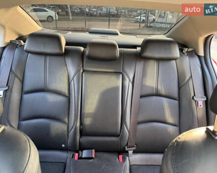 Красный Мазда 3, объемом двигателя 2.5 л и пробегом 100 тыс. км за 13000 $, фото 17 на Automoto.ua