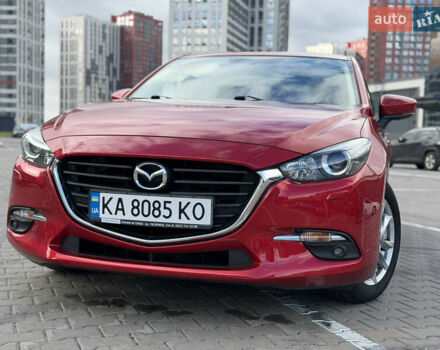 Красный Мазда 3, объемом двигателя 1.5 л и пробегом 56 тыс. км за 15799 $, фото 1 на Automoto.ua