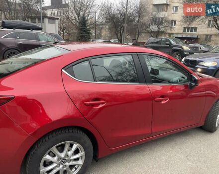 Красный Мазда 3, объемом двигателя 1.5 л и пробегом 125 тыс. км за 13600 $, фото 2 на Automoto.ua