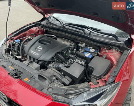 Красный Мазда 3, объемом двигателя 1.5 л и пробегом 125 тыс. км за 13600 $, фото 7 на Automoto.ua