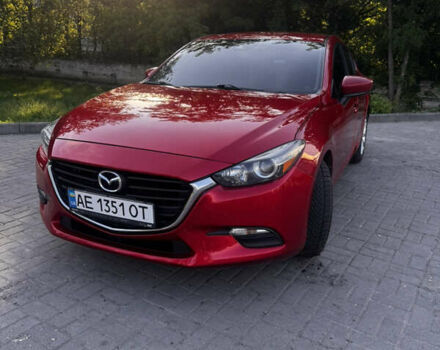 Красный Мазда 3, объемом двигателя 2 л и пробегом 116 тыс. км за 12000 $, фото 1 на Automoto.ua