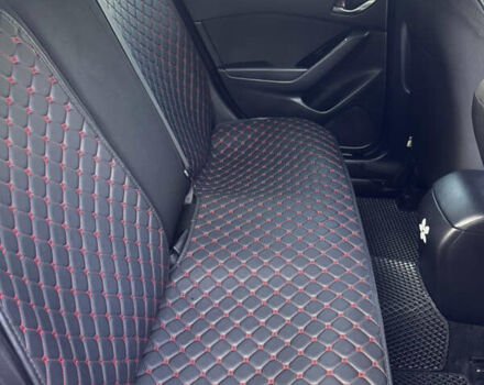 Красный Мазда 3, объемом двигателя 2 л и пробегом 123 тыс. км за 12000 $, фото 11 на Automoto.ua