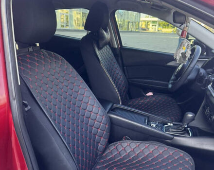 Красный Мазда 3, объемом двигателя 2 л и пробегом 123 тыс. км за 12000 $, фото 13 на Automoto.ua