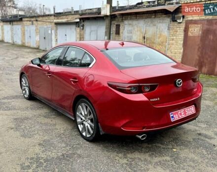 Красный Мазда 3, объемом двигателя 2.49 л и пробегом 101 тыс. км за 15900 $, фото 1 на Automoto.ua