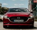Красный Мазда 3, объемом двигателя 2.49 л и пробегом 90 тыс. км за 14900 $, фото 1 на Automoto.ua