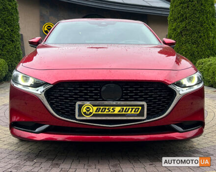 Красный Мазда 3, объемом двигателя 2 л и пробегом 50 тыс. км за 24500 $, фото 1 на Automoto.ua