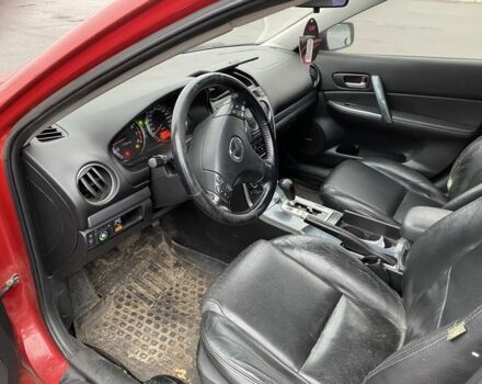 Красный Мазда 3, объемом двигателя 2.3 л и пробегом 503 тыс. км за 3500 $, фото 6 на Automoto.ua