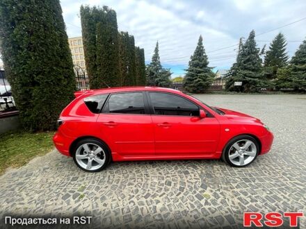Красный Мазда 3, объемом двигателя 2 л и пробегом 270 тыс. км за 4999 $, фото 1 на Automoto.ua