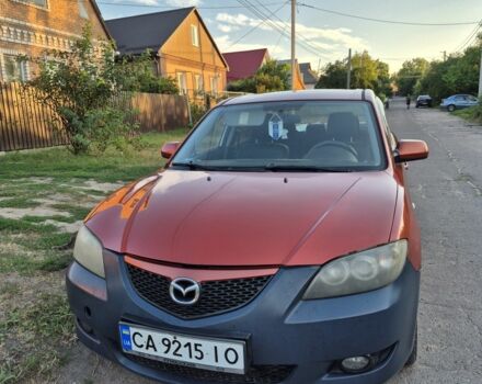 Красный Мазда 3, объемом двигателя 1.6 л и пробегом 288 тыс. км за 2398 $, фото 1 на Automoto.ua