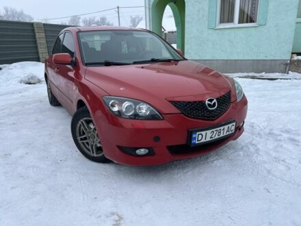 Червоний Мазда 3, об'ємом двигуна 1.6 л та пробігом 215 тис. км за 4100 $, фото 1 на Automoto.ua