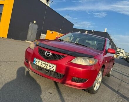 Красный Мазда 3, объемом двигателя 2 л и пробегом 245 тыс. км за 2400 $, фото 1 на Automoto.ua