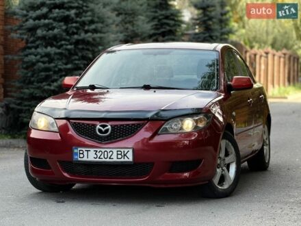 Червоний Мазда 3, об'ємом двигуна 2 л та пробігом 250 тис. км за 3900 $, фото 1 на Automoto.ua