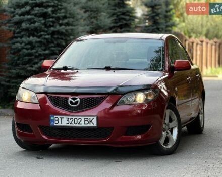 Красный Мазда 3, объемом двигателя 2 л и пробегом 250 тыс. км за 3900 $, фото 1 на Automoto.ua