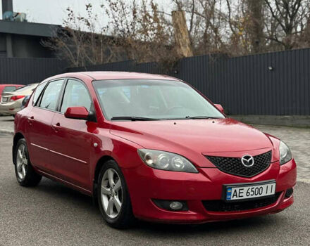 Красный Мазда 3, объемом двигателя 1.6 л и пробегом 207 тыс. км за 4900 $, фото 1 на Automoto.ua