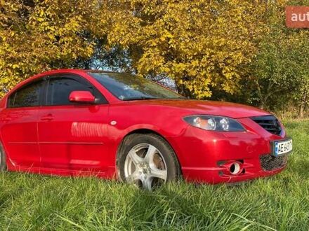 Красный Мазда 3, объемом двигателя 2 л и пробегом 300 тыс. км за 4000 $, фото 1 на Automoto.ua