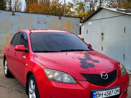 Красный Мазда 3, объемом двигателя 1.6 л и пробегом 174 тыс. км за 4300 $, фото 1 на Automoto.ua