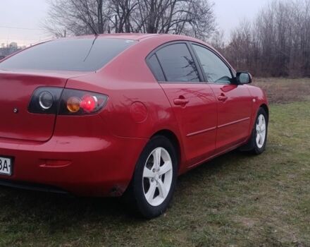 Червоний Мазда 3, об'ємом двигуна 2 л та пробігом 203 тис. км за 4250 $, фото 1 на Automoto.ua