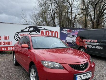 Красный Мазда 3, объемом двигателя 1.6 л и пробегом 203 тыс. км за 5300 $, фото 1 на Automoto.ua
