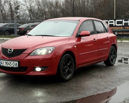 Красный Мазда 3, объемом двигателя 1.6 л и пробегом 249 тыс. км за 5699 $, фото 1 на Automoto.ua