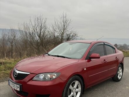 Красный Мазда 3, объемом двигателя 1.6 л и пробегом 280 тыс. км за 4500 $, фото 1 на Automoto.ua