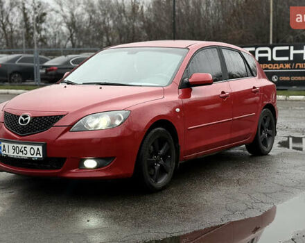 Красный Мазда 3, объемом двигателя 1.6 л и пробегом 249 тыс. км за 5699 $, фото 1 на Automoto.ua