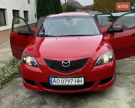 Красный Мазда 3, объемом двигателя 1.35 л и пробегом 195 тыс. км за 5100 $, фото 1 на Automoto.ua