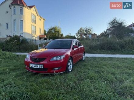 Красный Мазда 3, объемом двигателя 1.6 л и пробегом 242 тыс. км за 4950 $, фото 1 на Automoto.ua