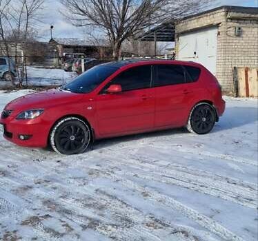 Красный Мазда 3, объемом двигателя 1.6 л и пробегом 149 тыс. км за 6000 $, фото 1 на Automoto.ua