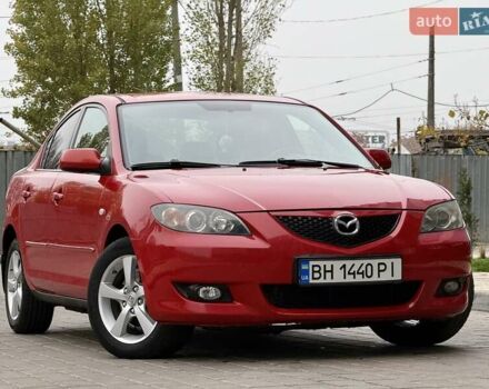 Красный Мазда 3, объемом двигателя 1.6 л и пробегом 207 тыс. км за 4400 $, фото 1 на Automoto.ua