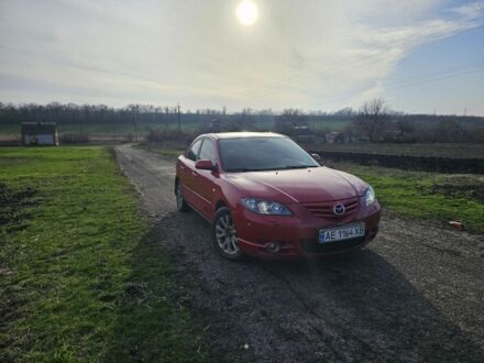 Красный Мазда 3, объемом двигателя 2 л и пробегом 260 тыс. км за 4800 $, фото 1 на Automoto.ua