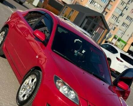 Красный Мазда 3, объемом двигателя 2 л и пробегом 230 тыс. км за 6000 $, фото 1 на Automoto.ua