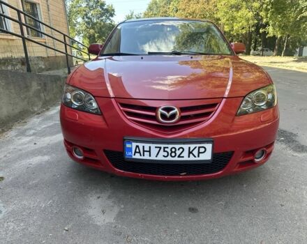 Красный Мазда 3, объемом двигателя 2 л и пробегом 203 тыс. км за 3503 $, фото 1 на Automoto.ua