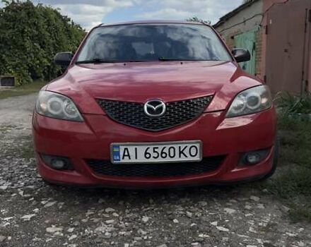 Красный Мазда 3, объемом двигателя 1.6 л и пробегом 216 тыс. км за 4100 $, фото 1 на Automoto.ua