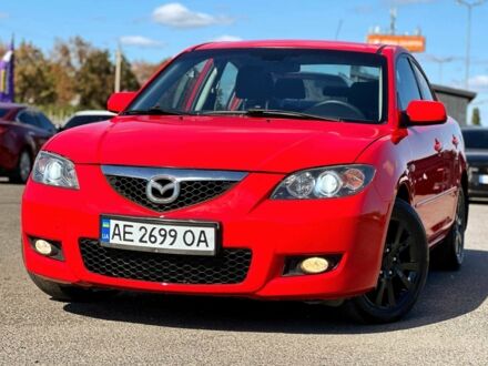 Красный Мазда 3, объемом двигателя 1.6 л и пробегом 225 тыс. км за 5800 $, фото 1 на Automoto.ua