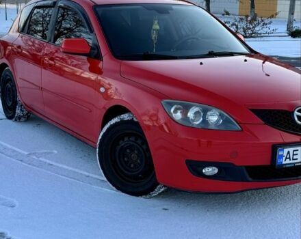Красный Мазда 3, объемом двигателя 1.3 л и пробегом 300 тыс. км за 5000 $, фото 1 на Automoto.ua