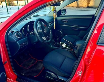 Красный Мазда 3, объемом двигателя 1.3 л и пробегом 300 тыс. км за 4700 $, фото 1 на Automoto.ua