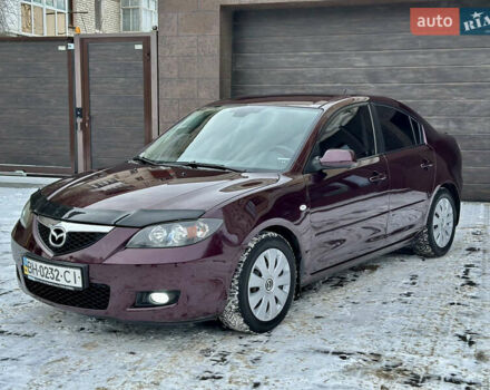 Красный Мазда 3, объемом двигателя 1.6 л и пробегом 153 тыс. км за 5700 $, фото 1 на Automoto.ua