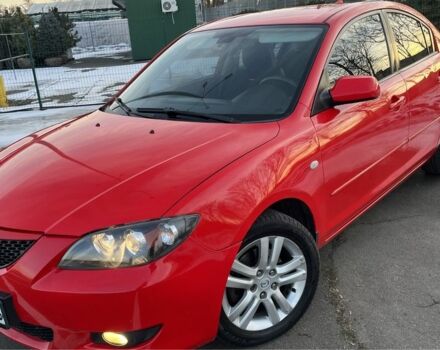 Красный Мазда 3, объемом двигателя 1.6 л и пробегом 205 тыс. км за 5800 $, фото 1 на Automoto.ua