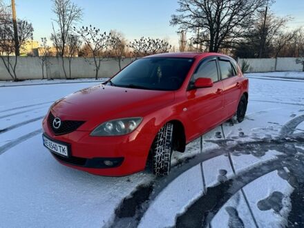 Красный Мазда 3, объемом двигателя 1.3 л и пробегом 305 тыс. км за 4800 $, фото 1 на Automoto.ua