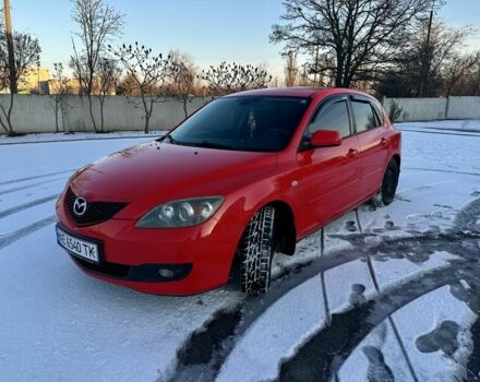Красный Мазда 3, объемом двигателя 1.3 л и пробегом 305 тыс. км за 4800 $, фото 1 на Automoto.ua