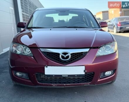 Красный Мазда 3, объемом двигателя 2 л и пробегом 247 тыс. км за 4500 $, фото 1 на Automoto.ua
