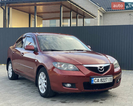 Красный Мазда 3, объемом двигателя 2 л и пробегом 244 тыс. км за 6800 $, фото 1 на Automoto.ua